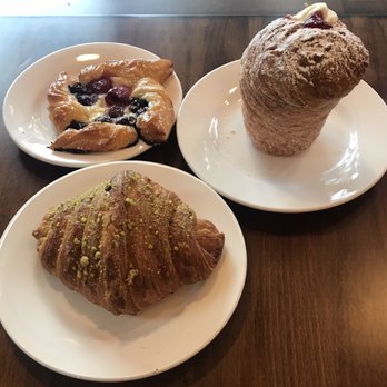 Petit Pierre Bakery - Top left: cream cheese & berries Top right: cruffin Bottom: pistachio croissant - Bakeries Near Me - Seattle, Washington Petit Pierre Bakery - Top left: cream cheese & berries Top right: cruffin Bottom: pistachio croissant - Bakeries Near Me - Seattle, Washington