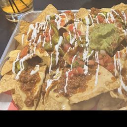 Nachos with all the trimmings with Sloppy Joe sweet & spicy on top.... Lots to eat!