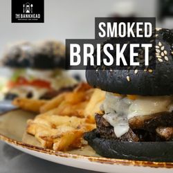 The Bankhead - Savour the smoky goodness of our $22 Beef Brisket Sandwich, topped with sautéed mushrooms, onions, and melted cheese!