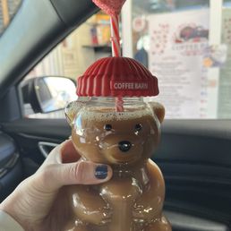 Glass bear with coffee and cake pop