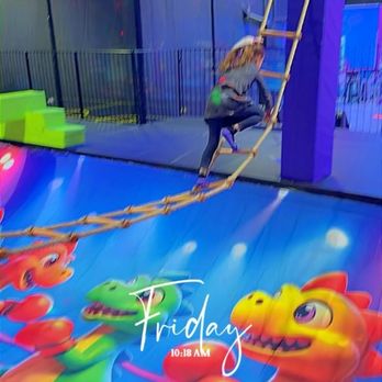 Altitude Trampoline Park - My daughter climbing the ladder and below her is the deflated jumper!!! She could've been seriously injured!! - Trampoline Parks Near Me - Milpitas, California