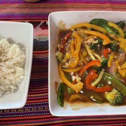 Rice with vegetables sautéed in garlic vegan sauce. Rice with vegetables sautéed in garlic vegan sauce.