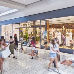Washington Square - Shoppers walk past the Aritzia storefront inside Washington Square.