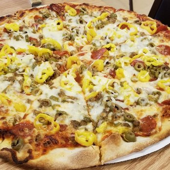 Pizza Sam's - a pizza on a plate - Pizza Near Me - Battle Creek, Michigan