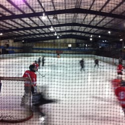 Olympic Ice Skating Centre - Ice hockey underway - hope they're off b4 kids get in!!