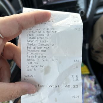 Jason's Deli - a person holding a receipt - Salad Near Me - Georgetown, Texas Jason's Deli - a person holding a receipt - Salad Near Me - Georgetown, Texas