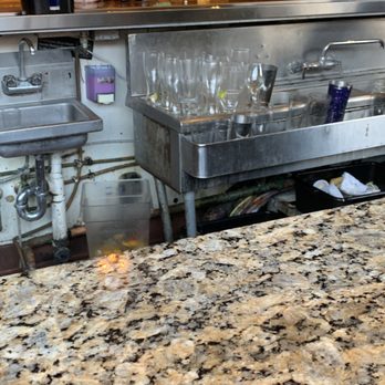 Saddle Ranch - Disgusting bar area. So many health codes broken in this photo alone. Not to mention the pervasive smell of rotting garbage. - Steakhouses Near Me - Orange, California Saddle Ranch - Disgusting bar area. So many health codes broken in this photo alone. Not to mention the pervasive smell of rotting garbage. - Steakhouses Near Me - Orange, California