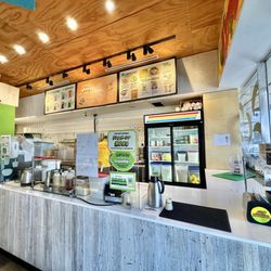 Inside at the counter.