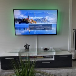 RIch Mounts - Tv mounted with wires hidden using cord strip