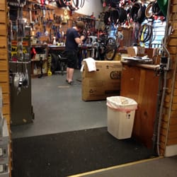 Ray's Cycle - The guy fixing one of our bikes now.