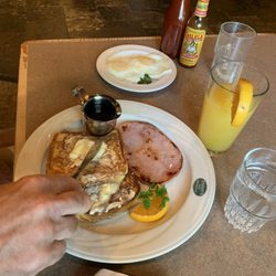 Jimmy's Family Restaurant - French Toast with a side of eggs and a mimosa