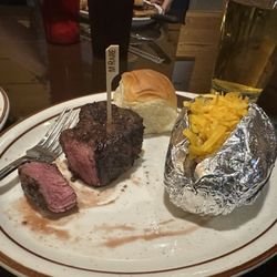 Black Bison Pub - Filet mignon, loaded baked potato, dinner roll