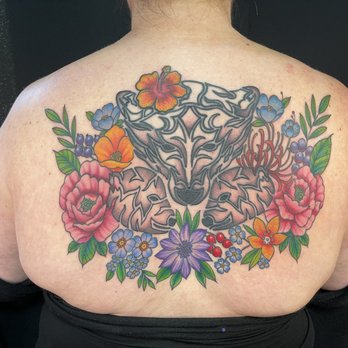 Royal Six Tattoo - Large back piece.  The momma bear and one baby were old and he re-did them, added the 2nd baby bear, flowers and bear shading. - Tattoo Near Me - Placerville, California