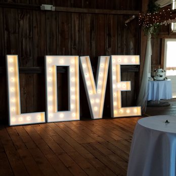 Brauer Barn - Love this 5 foot high light up signage next to the bar. - Wedding Planning Near Me - Winnebago, Illinois