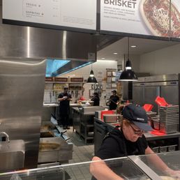 Workers on the phone, talking in the back. Lady making the food is a sweetheart, only one working. Workers on the phone, talking in the back. Lady making the food is a sweetheart, only one working.
