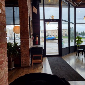 Neidhammer Coffee - Looking out the front door you can see additional parking across u.s. 40 - Coffee & Tea Near Me - Indianapolis, Indiana