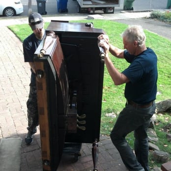 McCrea's A A Piano Moving - Piano is down the stairs successfully and will be wheeled out to their van. - Piano Services Near Me - Oakland, California