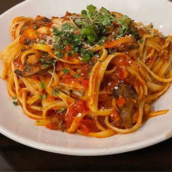 Ristorante Carmelo - a plate of pasta with meat and tomato sauce - Italian Near Me - Orange Beach, Alabama