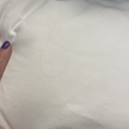 Hair UNDER the sheet, in the sheets, and sand everywhere!