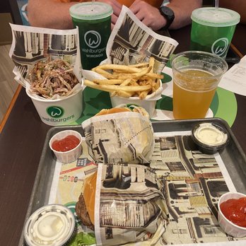 Wahlburgers - 2 Our burgers, fries and onion rings with soft drinks and of course a Wahl brewski! - American Near Me - Cabazon, California Wahlburgers - 2 Our burgers, fries and onion rings with soft drinks and of course a Wahl brewski! - American Near Me - Cabazon, California