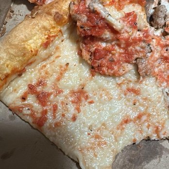Devil's Pizzeria  - So much sauce! So delicious! How can anyone eat this without a beach towel as a napkin? SERIOUSLY...this is photo proof of not giving a - Pizza Near Me - Durham, North Carolina