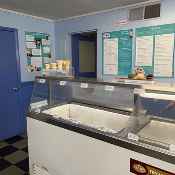 Village Creamery - a display of a variety of ice creams - Ice Cream & Frozen Yogurt Near Me - Brooklyn, Michigan Village Creamery - a display of a variety of ice creams - Ice Cream & Frozen Yogurt Near Me - Brooklyn, Michigan
