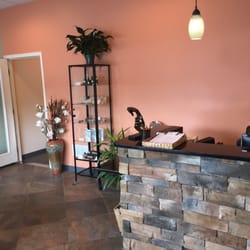 Holistic Solutions - Lobby very inviting with earthy tones and tranquil highlights.