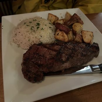 Tra Di Noi Ristorante - New York strip with roasted potatoes and rice - Italian Near Me - Bowling Green, Kentucky