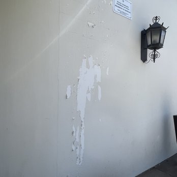Bashas' -  a wall with a lamp and a sign on it - Grocery Near Me - Buckeye, Arizona