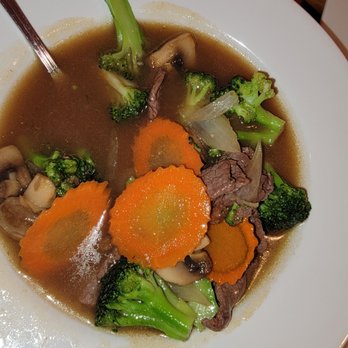 Thai Thai Cuisine - Pad beef and vegetables in oyster sauce served with white rice - Thai Near Me - Syracuse, New York Thai Thai Cuisine - Pad beef and vegetables in oyster sauce served with white rice - Thai Near Me - Syracuse, New York