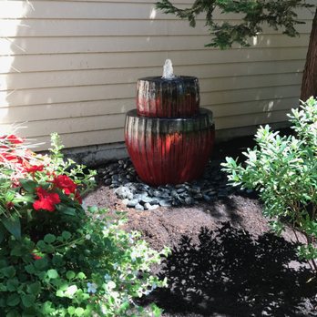 The Water Feature Pro's - a fountain in a garden - Landscaping Near Me - Milwaukie, Oregon The Water Feature Pro's - a fountain in a garden - Landscaping Near Me - Milwaukie, Oregon