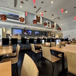 Spicy 9 Sushi Bar & Asian Restaurant - Inside seating and bar view