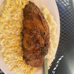 Fried chicken plate with mashed potatoes and cream corn