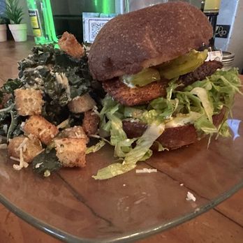 Taproot Cafe & Bar - Blackened halibut sandwich with kale Cesar salad. - Juice Bars & Smoothies Near Me - Seattle, Washington Taproot Cafe & Bar - Blackened halibut sandwich with kale Cesar salad. - Juice Bars & Smoothies Near Me - Seattle, Washington