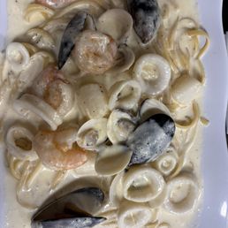 Seafood combo with alfredo sauce