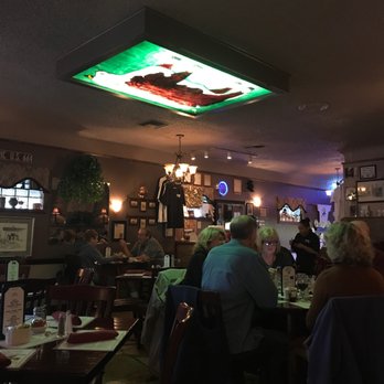 Rod's Steak House - Upside down cattle painting on ceiling. - Steakhouses Near Me - Williams, Arizona