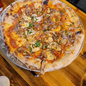 Heretic Brewery and Distillery - Pizza with sausage, mushrooms,and red onion. Delicious.  Ranch comes in paper cups, which I appreciated. - Burgers Near Me - Fairfield, California