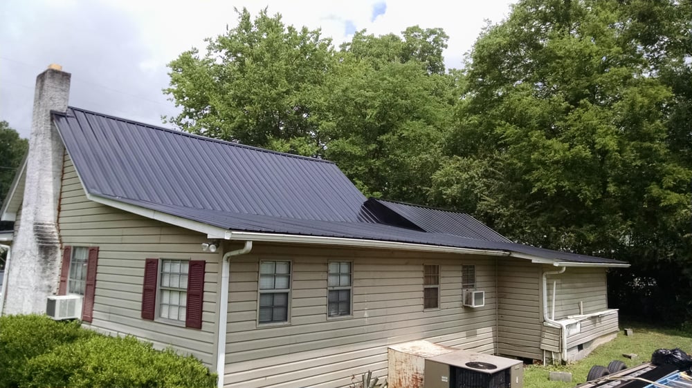 Slide of JC Metal Roofing