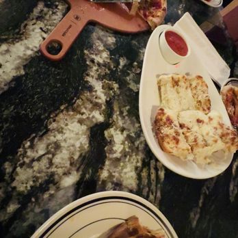 Giovanni's Pizzeria & Kitchen - Perfectly burnt end crust pizza and cheesy bread - Italian Near Me - Davenport, Florida Giovanni's Pizzeria & Kitchen - Perfectly burnt end crust pizza and cheesy bread - Italian Near Me - Davenport, Florida