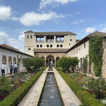 GranaVision - One of the palace entrances at The Nasrid Palaces - Travel Agents Near Me - Granada, GR