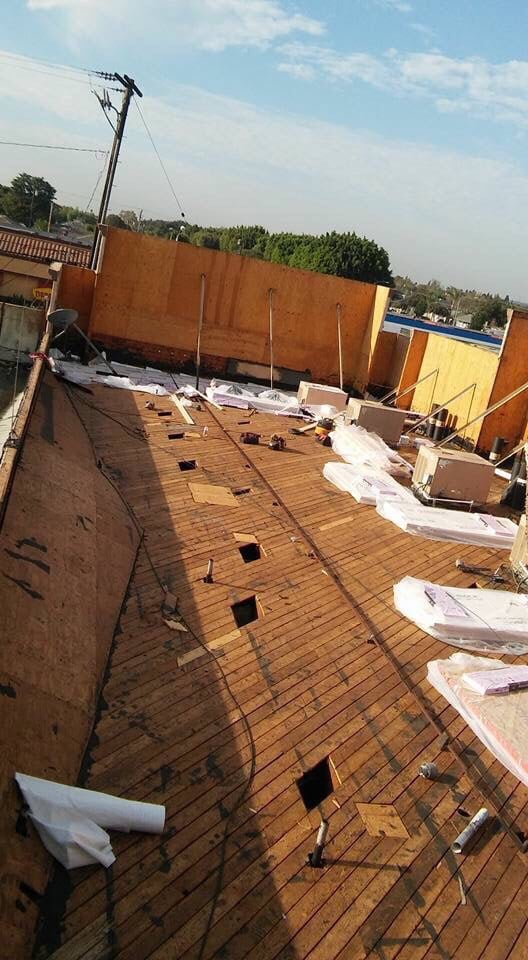 Slide of Tony and Velasco Roofing Constructions