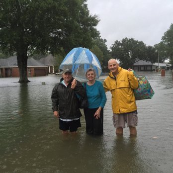 Michael Smith - State Farm Insurance Agent - Mike Smith helping out customers during the August flood - Home & Rental Insurance Near Me - Lafayette, Louisiana