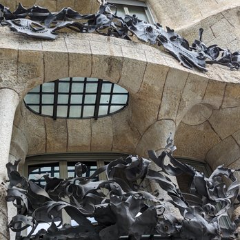 La Pedrera - Casa Milà - Facade with stone and ironwork - Museums Near Me - Barcelona, B La Pedrera - Casa Milà - Facade with stone and ironwork - Museums Near Me - Barcelona, B