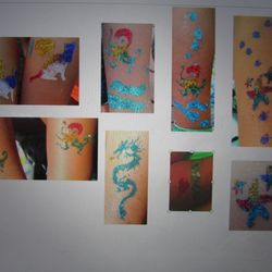 Glitter Tattoos done at Mia's Party that Harry Booked. One face painting and one dragon are not included. The kids choose those designs!