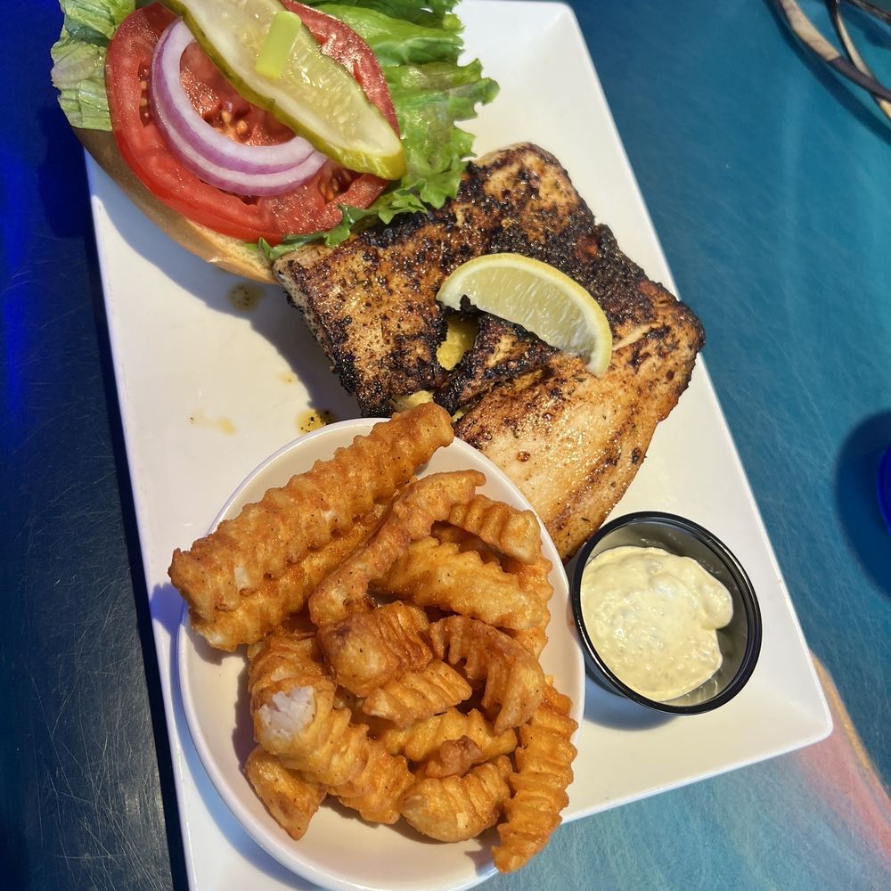 Coconuts On The Beach - Mahi Sandwich - Bars Near Me - Cocoa Beach, Florida Coconuts On The Beach - Mahi Sandwich - Bars Near Me - Cocoa Beach, Florida