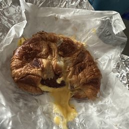 Sausage egg and cheese on croissant. Seriously the best breakfast sandwich in all of Queens. Sausage egg and cheese on croissant. Seriously the best breakfast sandwich in all of Queens.