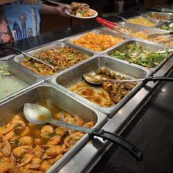 Asian Buffet - Shrimp, braised mushrooms, chow mien, fried rice, orange chicken, etc.