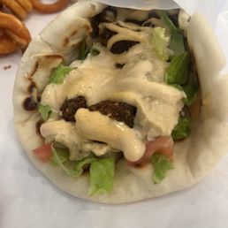 Falafel wrap and curly fries. The small portions make it look like the ramekins are large, but they aren't.