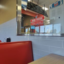 Domino's Pizza - Inside seating plus you can watch your pizza getting made