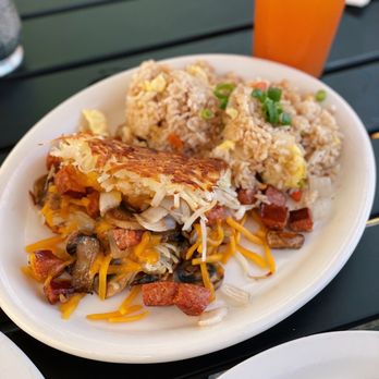 Moke's Bread & Breakfast - Stuffed hash browns (mokapu style) w/ fried rice - Breakfast & Brunch Near Me - Kailua, Hawaii Moke's Bread & Breakfast - Stuffed hash browns (mokapu style) w/ fried rice - Breakfast & Brunch Near Me - Kailua, Hawaii
